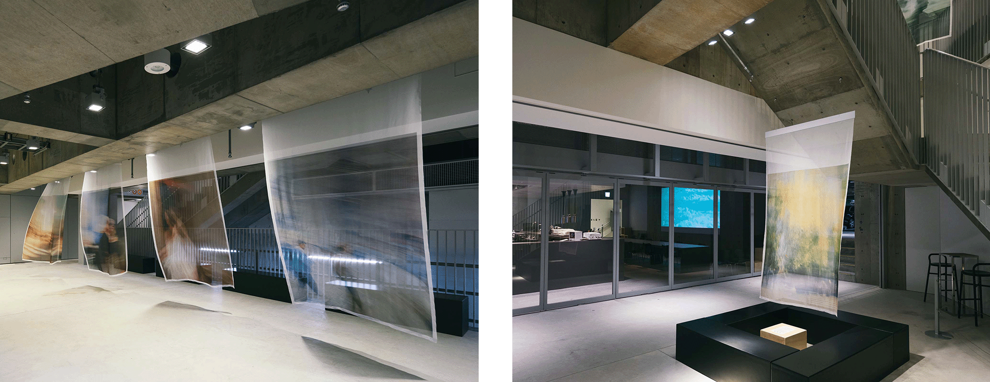 At Ginza Sony Park B1, multiple translucent panels hang in sequence, blending blurred figures with the concrete architecture. In the atrium of Ginza Sony Park B3, a translucent fabric artwork hangs quietly, framed by concrete beams and stairs, echoing the video projection beyond.